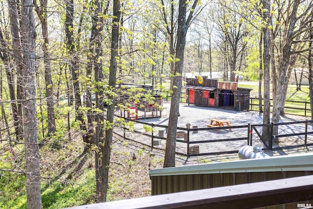 wooden deck with an outbuilding