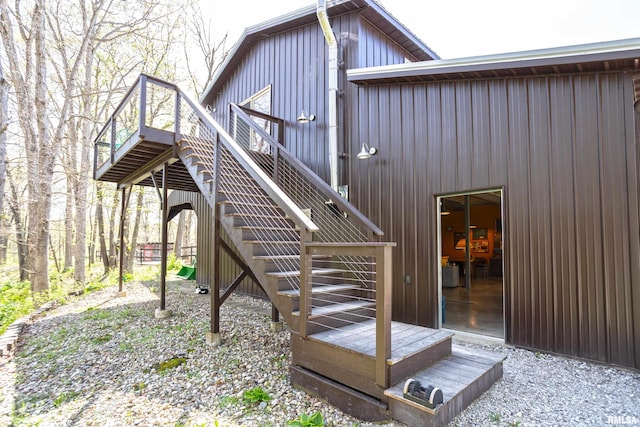 wooden deck featuring stairs