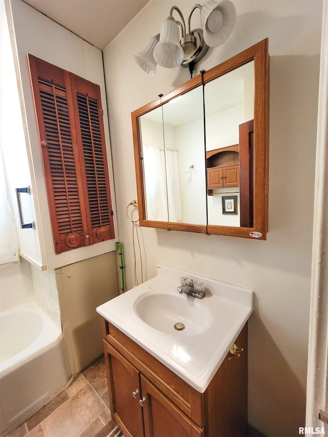 439 Fair Ave, Flora, IL 62839 - bathroom with a tub to relax in and vanity
