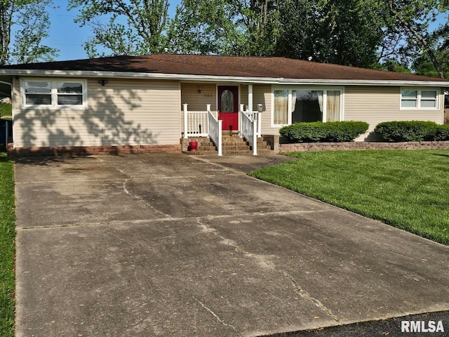 ranch-style home with a front lawn