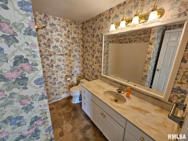 bathroom with vanity, toilet, a shower with shower curtain, wallpapered walls, and visible vents