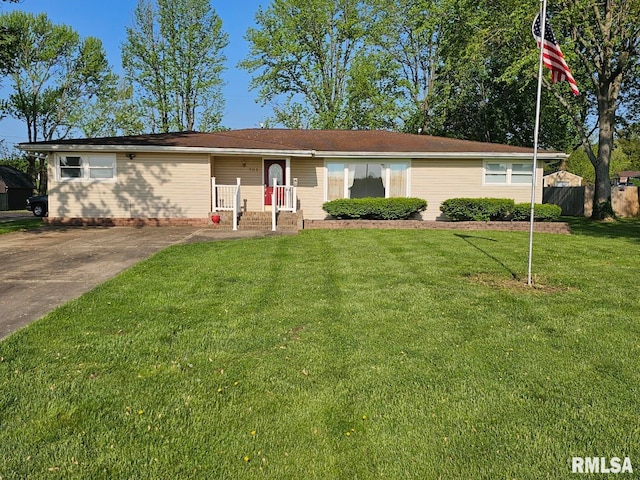 single story home with fence and a front yard