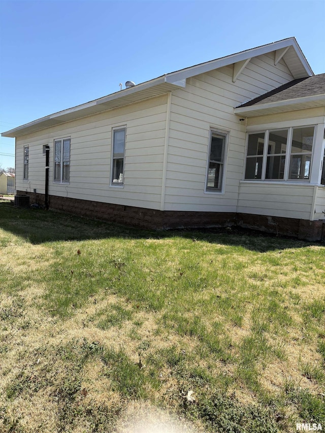 920 S 12th St, Herrin, IL 62948 - view of home's exterior featuring a lawn