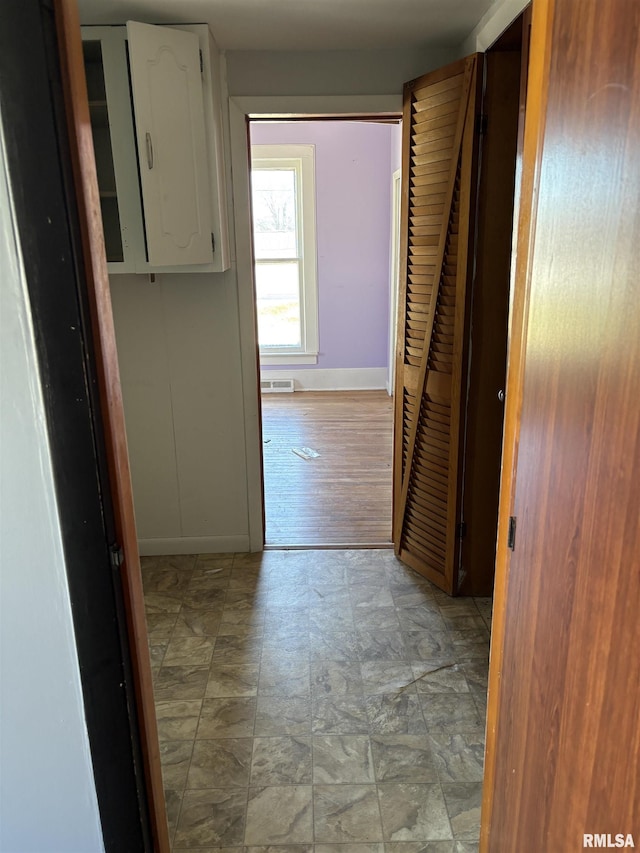 920 S 12th St, Herrin, IL 62948 - hallway featuring baseboards, electric panel, and visible vents