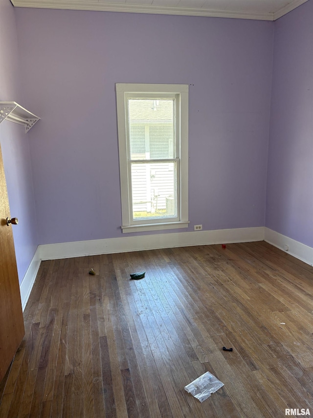 920 S 12th St, Herrin, IL 62948 - spare room with baseboards, ornamental molding, and hardwood / wood-style flooring
