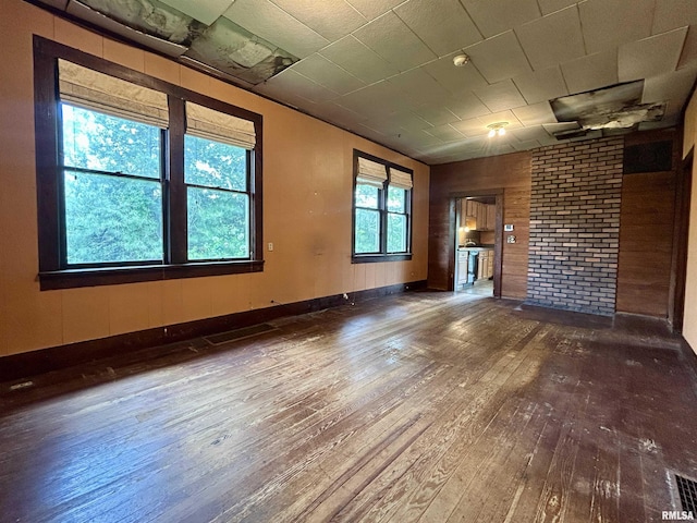 unfurnished living room featuring hardwood / wood-style floors