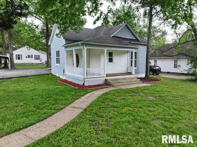 800 Division St, Carterville, IL 62918 - view of front of home featuring covered porch and a front yard