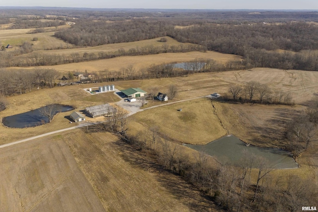 aerial view with a water view and a rural view