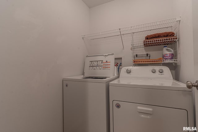 washroom with laundry area and washing machine and dryer