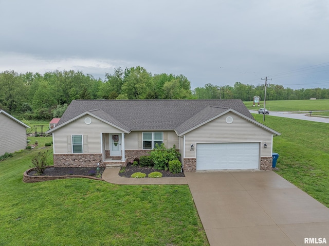 view of front facade featuring an attached garage, a shingled roof, brick siding, a front yard, and concrete driveway