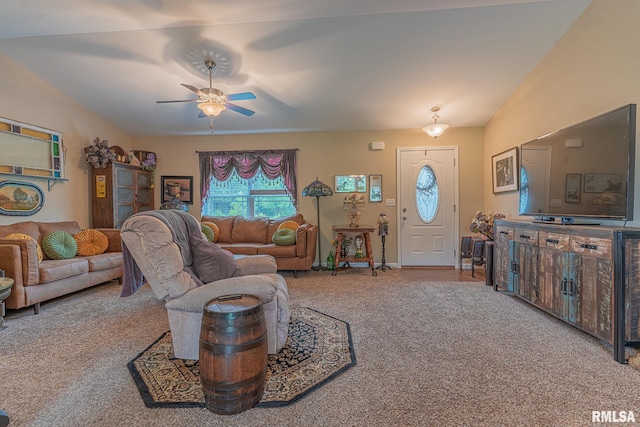 living room with baseboards, ceiling fan, and carpet flooring