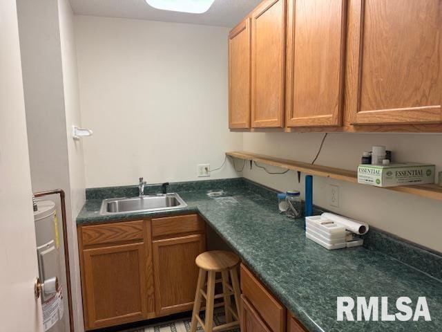 301 S Pershing St, Energy, IL 62933 - kitchen featuring dark countertops and a sink