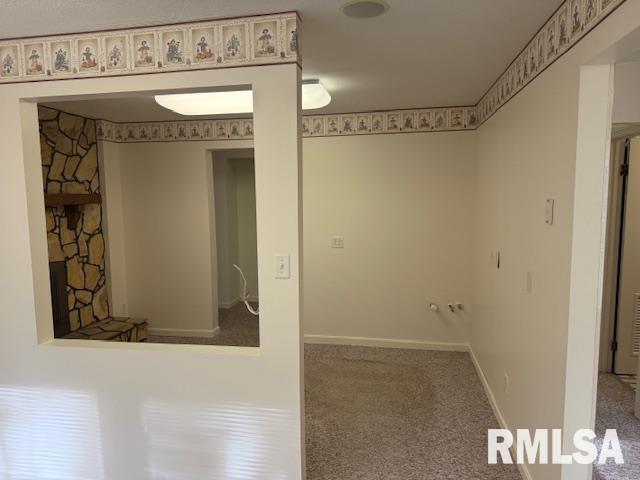 301 S Pershing St, Energy, IL 62933 - carpeted spare room featuring baseboards