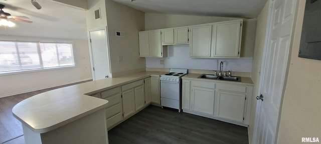 kitchen with ceiling fan, a sink, a peninsula, lofted ceiling, and white electric range