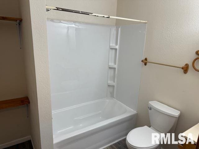 full bath with toilet and bathtub / shower combination