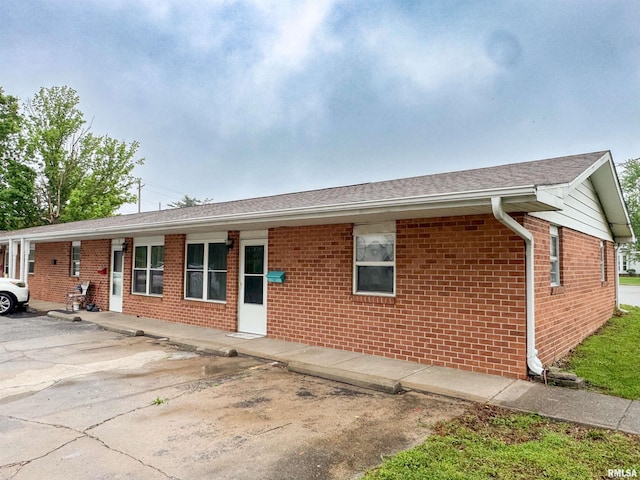 101 E Spring St, Anna, IL 62906 - ranch-style house with brick siding and a shingled roof