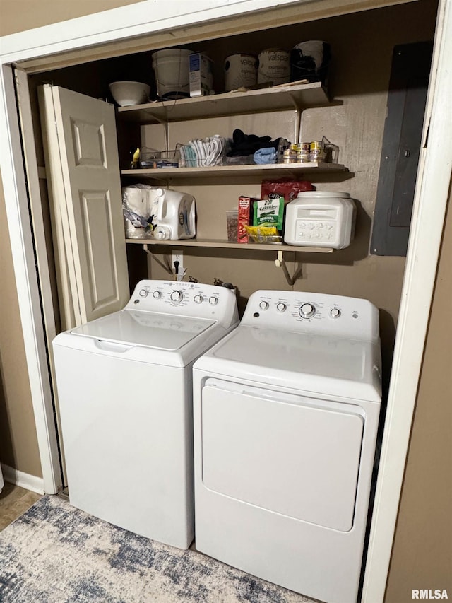 101 E Spring St, Anna, IL 62906 - clothes washing area with laundry area, washing machine and dryer, and electric panel