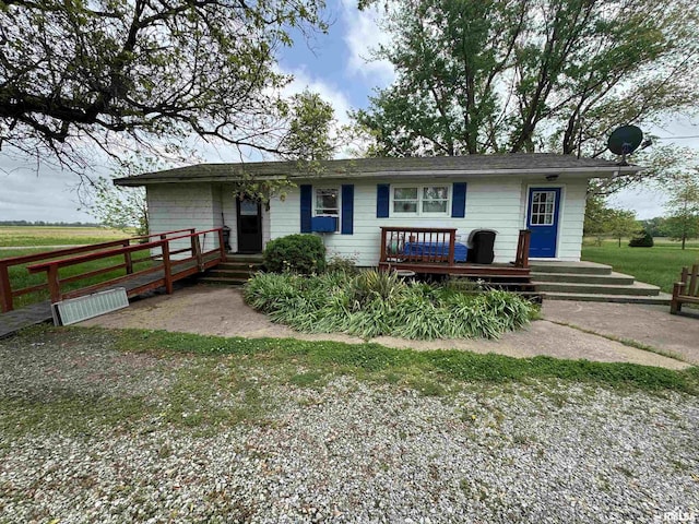 ranch-style home featuring a deck