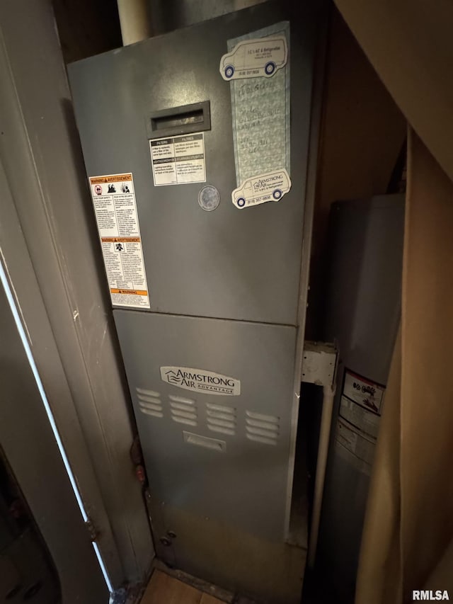 970 Beech Rd, Duquoin, IL 62832 - utility room with heating unit and water heater