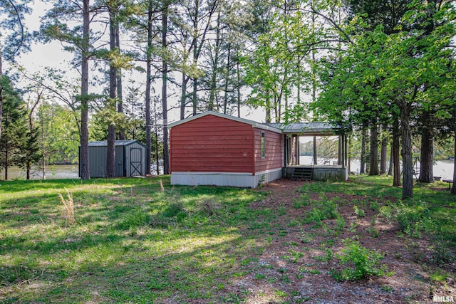 exterior space featuring a storage unit and an outdoor structure
