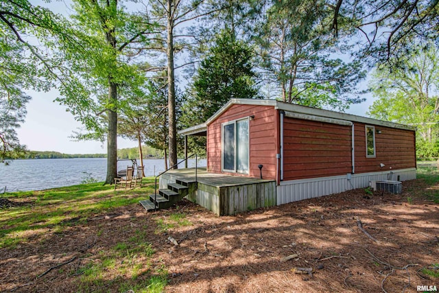 exterior space with a water view