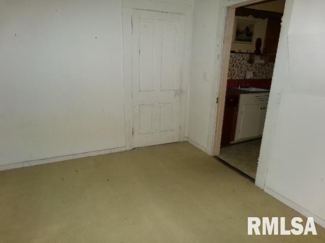 200 3rd St, Rosiclare, IL 62982 - unfurnished room featuring light colored carpet and a sink