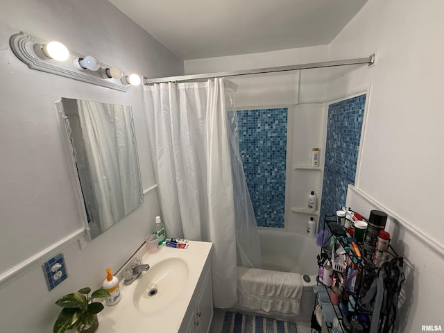 full bathroom with vanity and shower / bath combo