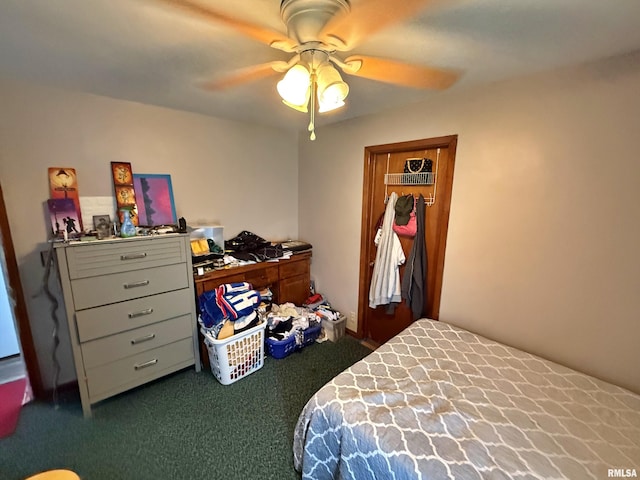 bedroom featuring dark carpet and a ceiling fan