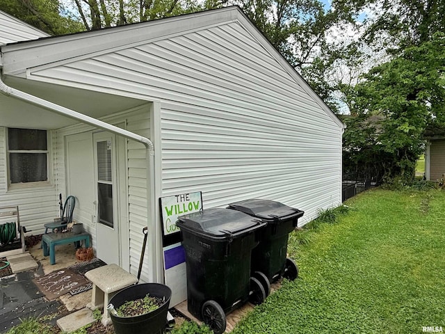 view of home's exterior featuring a yard