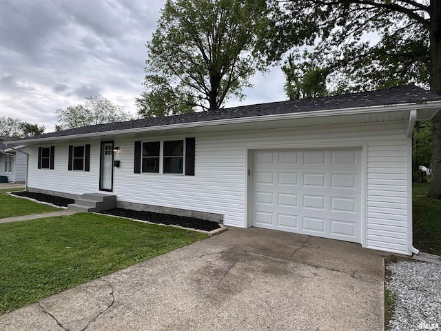 ranch-style home with a garage, roof with shingles, driveway, and a front yard
