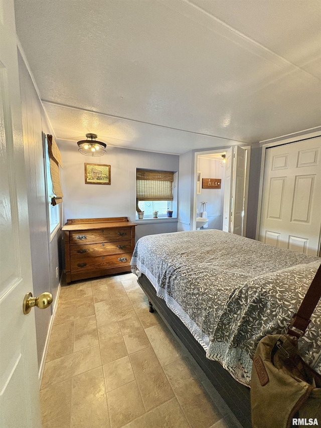 bedroom with baseboards