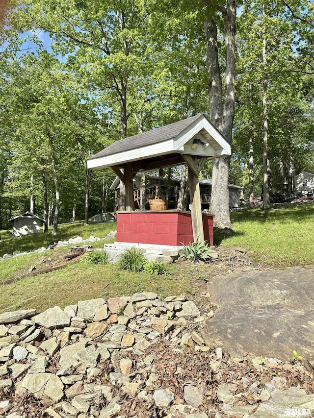 view of patio / terrace featuring an outbuilding