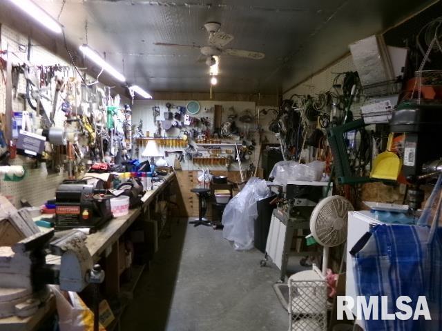 217 Trammel Rd, Carrier Mills, IL 62917 - miscellaneous room featuring ceiling fan, a workshop area, and concrete floors