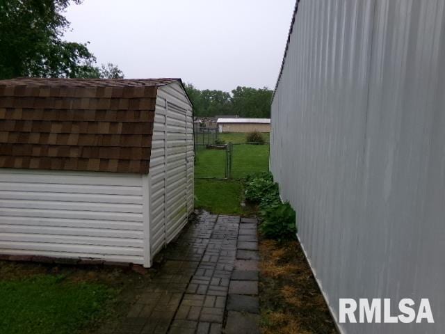 217 Trammel Rd, Carrier Mills, IL 62917 - view of outbuilding featuring fence and an outdoor structure