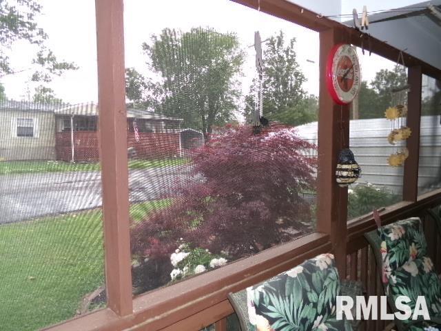 217 Trammel Rd, Carrier Mills, IL 62917 - exterior space featuring fence