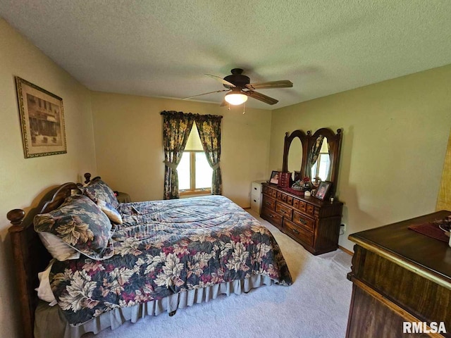 16123 N Hickory Ln, Woodlawn, IL 62898 - carpeted bedroom featuring a textured ceiling and ceiling fan