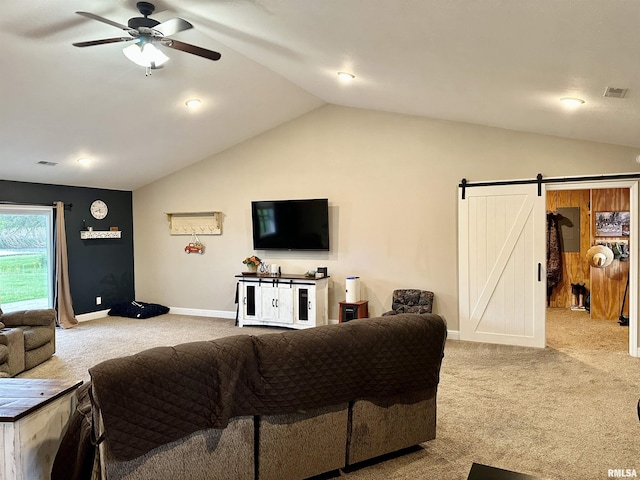 1821 Zion Hill Rd, Centralia, IL 62801 - living area with carpet, vaulted ceiling, a barn door, and ceiling fan