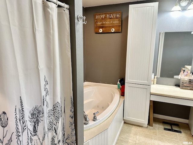 1821 Zion Hill Rd, Centralia, IL 62801 - bathroom featuring a tub with jets, tile patterned flooring, and vanity
