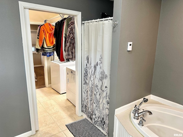 1821 Zion Hill Rd, Centralia, IL 62801 - full bathroom with independent washer and dryer, a bath, a shower with curtain, a walk in closet, and tile patterned floors