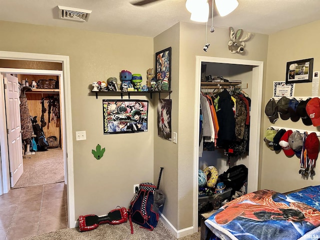 1821 Zion Hill Rd, Centralia, IL 62801 - carpeted bedroom with a closet and tile patterned flooring