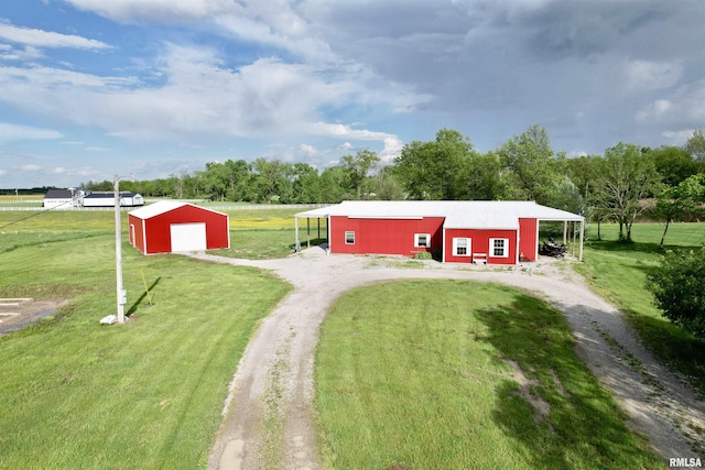 1821 Zion Hill Rd, Centralia, IL 62801 - view of pole building featuring driveway and a yard