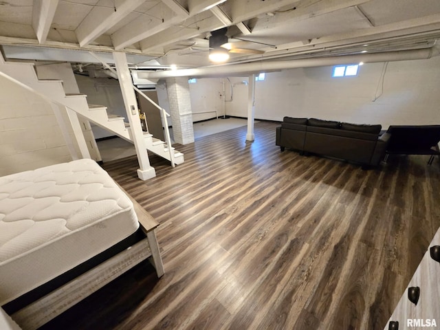 below grade area with stairs and wood finished floors