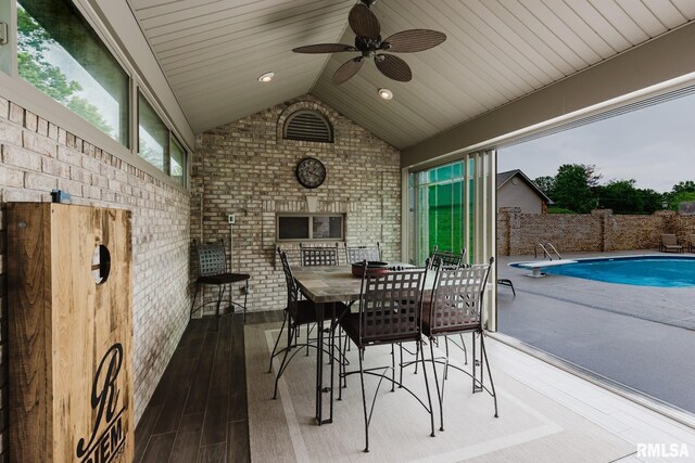 view of patio featuring fence, ceiling fan, and a fenced in pool