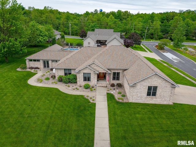 bird's eye view featuring a forest view