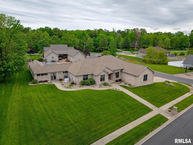aerial view with a wooded view