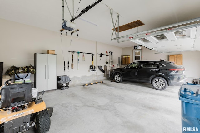 garage featuring a garage door opener