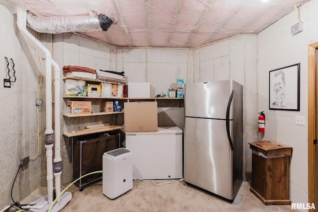 interior space with open shelves, freestanding refrigerator, and refrigerator