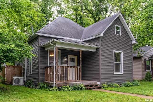 2016 Division St, Murphysboro, IL 62966 - bungalow with covered porch, a front yard, and a shingled roof