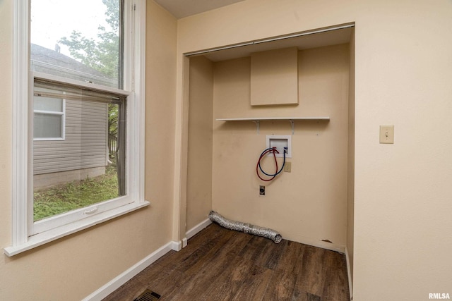 2016 Division St, Murphysboro, IL 62966 - laundry area with washer hookup, laundry area, hookup for an electric dryer, dark wood-type flooring, and baseboards