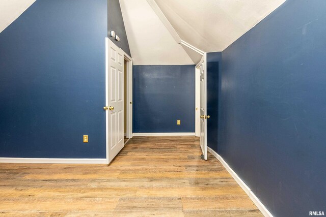 2016 Division St, Murphysboro, IL 62966 - corridor with baseboards, wood finished floors, and vaulted ceiling